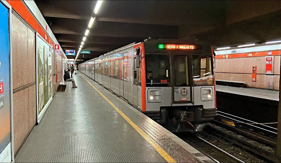 A metro train waiting on the subway station.